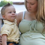 iStock_000003459658XSmall pregnant teenage mother with child
