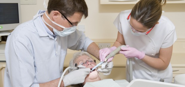 shutterstock_14465950 dentist and assistant