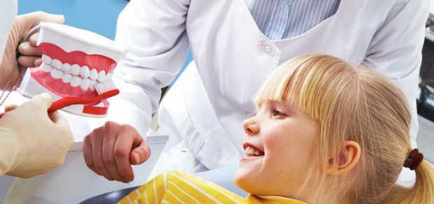 shutterstock_68251921 dental education young girl and nurses