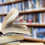 shutterstock_74085415 Education book on table in library