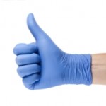 Picture of a hand wearing a surgical glove and making a thumbs-up sign