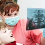 shutterstock_54042145 - Child, dentists & X-ray