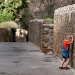 Upset girl facing the wall