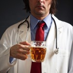 Doctor with pint of beer