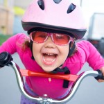 Young girl riding bike