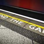 Underground station sign saying mind the gap