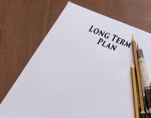Piece of paper with long term plan written on it