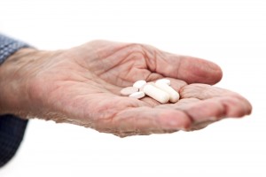 pills_in_hand_shutterstock_168523664 (2)