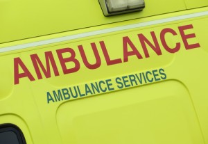 Close up of an ambulance showing the words ambulance services