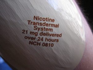 This trial saw a 50% cessation rate in individuals treated with transdermal nicotine patches or varenicline.