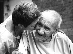 A family carer with an elderly man