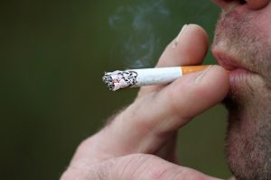 People with schizophrenia often report that smoking tobacco can help ease the symptoms of their illness.