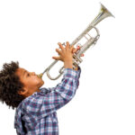 Young,Artist,Proudly,Plays,The,Trumpet.,Boy,Improvises,On,The