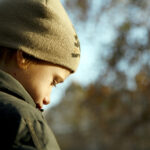 Sad,Boy,In,Autumn,Warm,Clothes,Outdoors