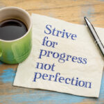 Strive,For,Progress,,Not,Perfection,-,Handwriting,On,A,Napkin
