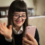 Cinematic,Shot,Of,Happy,Teen,Girl,With,Down,Syndrome,Making
