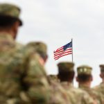 American Soldiers and US Flag. US troops