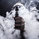 Girl,Soars,On,A,Black,Background,Vape