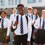 Portrait,Of,Smiling,Male,And,Female,High,School,Students,Wearing