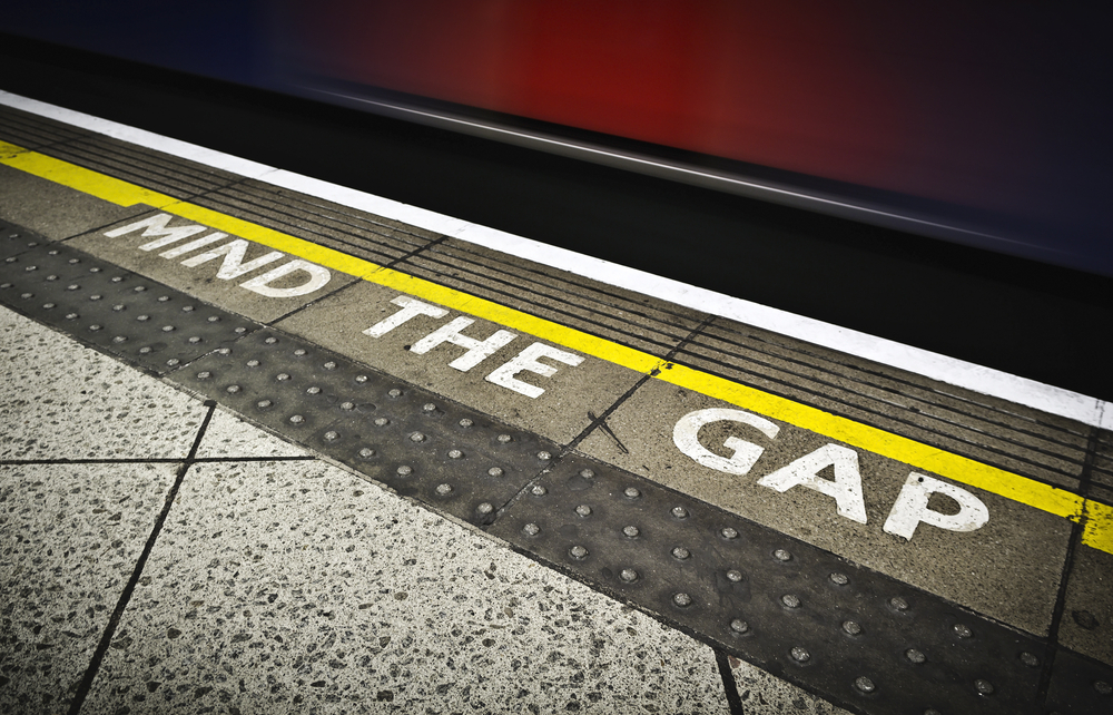 Underground station sign saying mind the gap