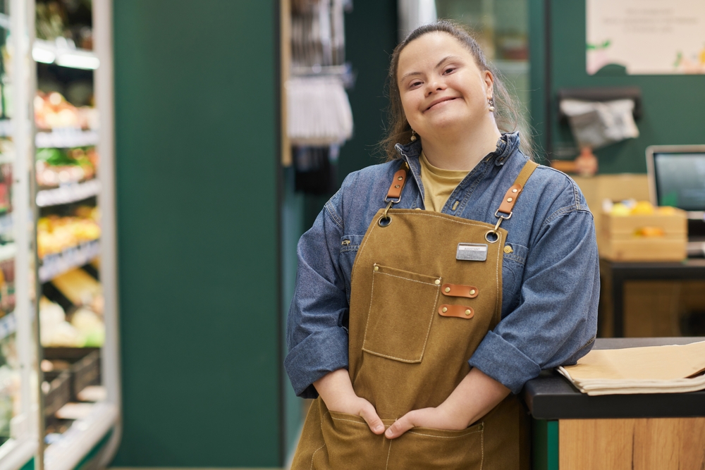 Waist,Up,Portrait,Of,Smiling,Young,Woman,With,Down,Syndrome