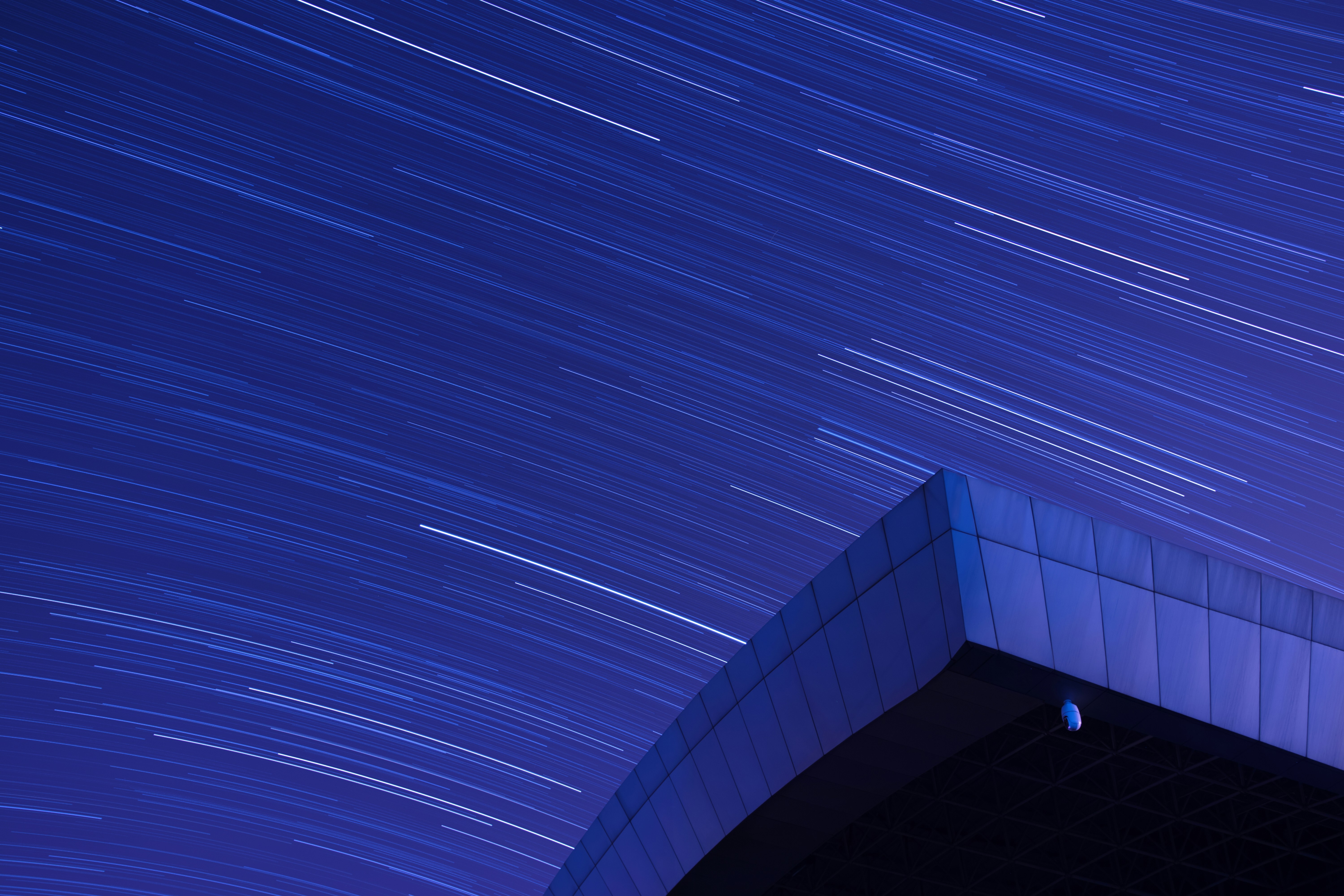 An abstract scene in blue and black