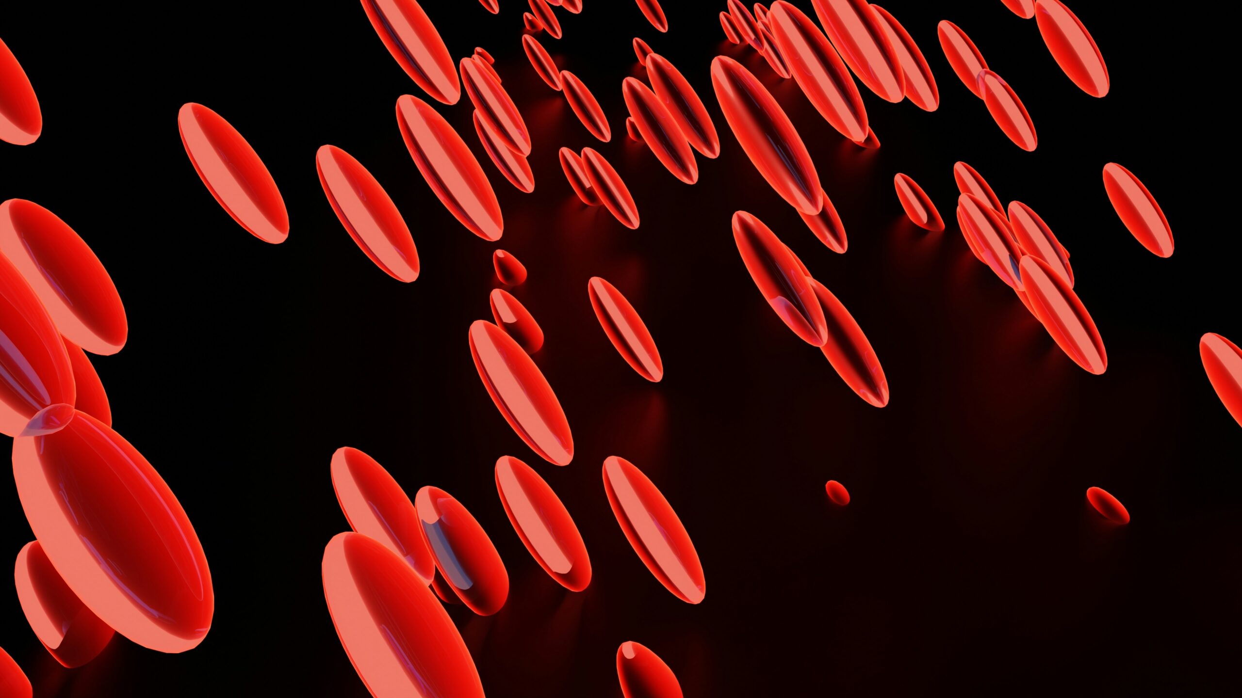 An abstract image of red disks on a black background