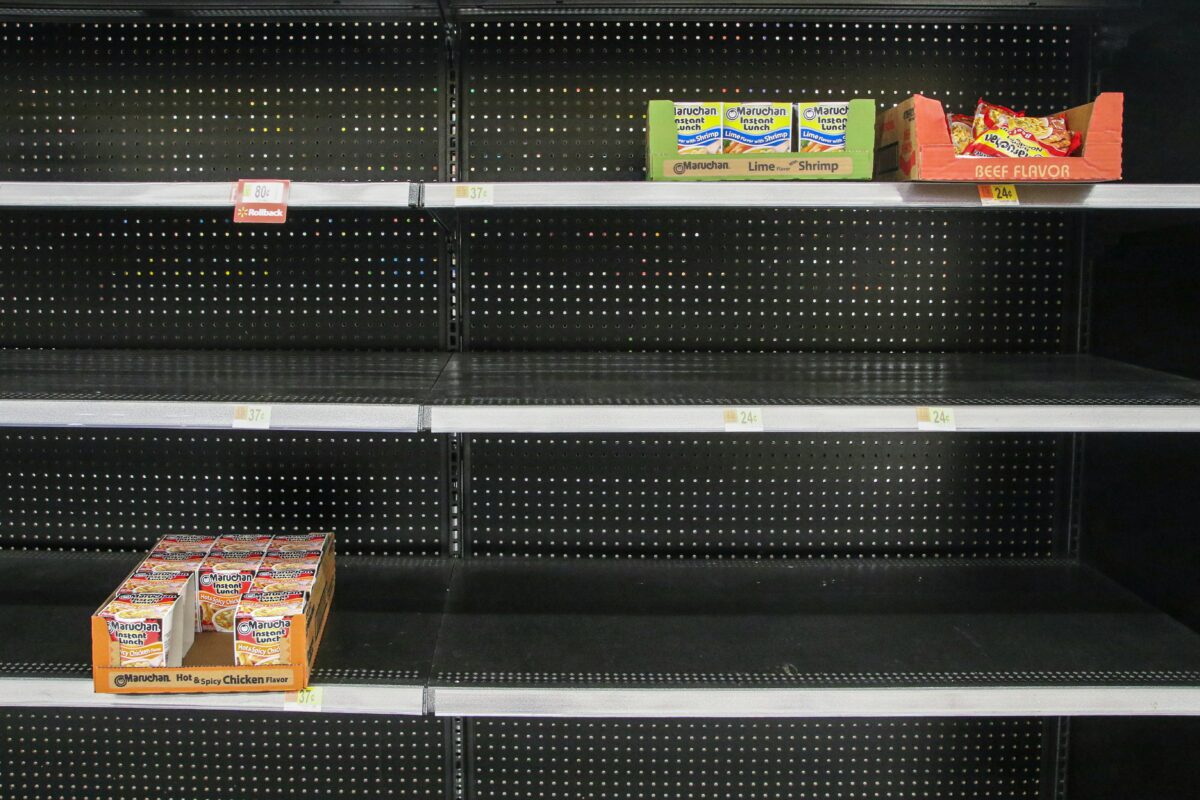 An almost empty food cupboard