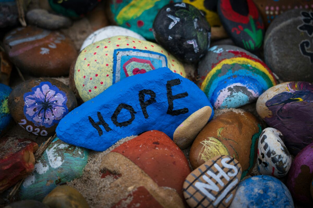 Some painted stones - one features the word hope