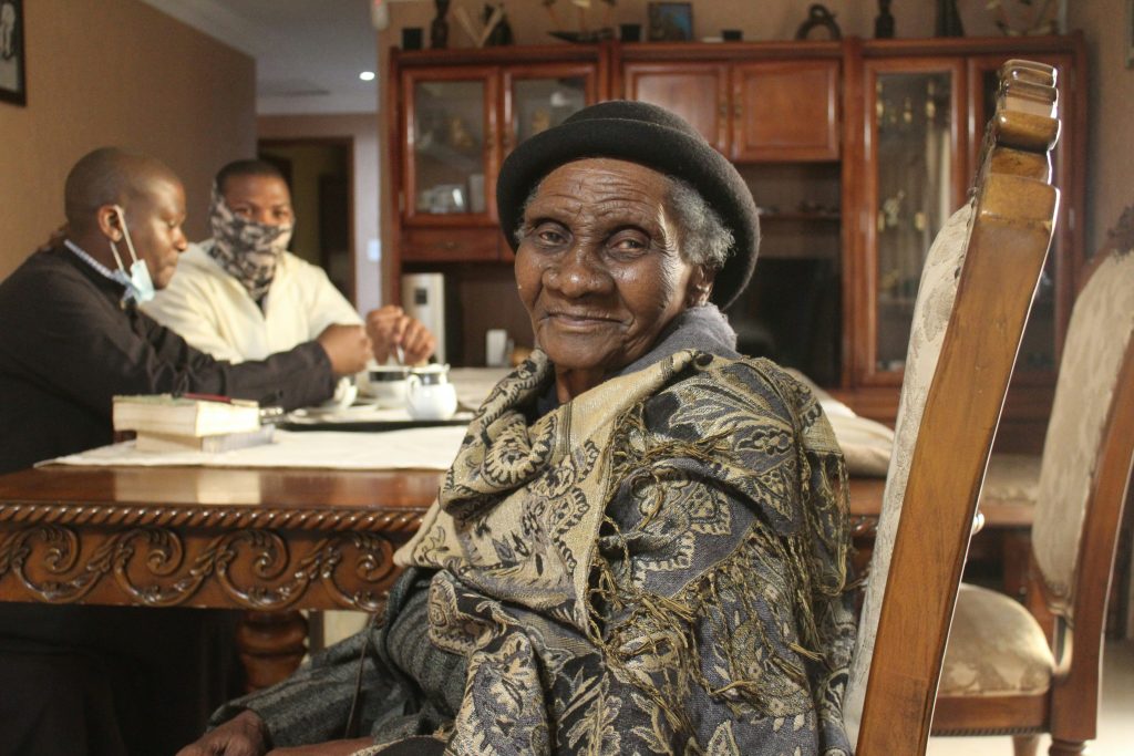 Smiling older woman looking at camera